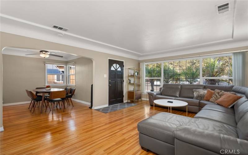 Living room seamlessly opens up to your dining room area.