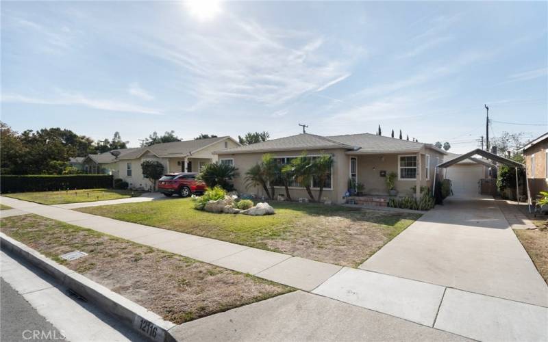 Home offers a long driveway to your oversized two car garage tucked away behind the home.