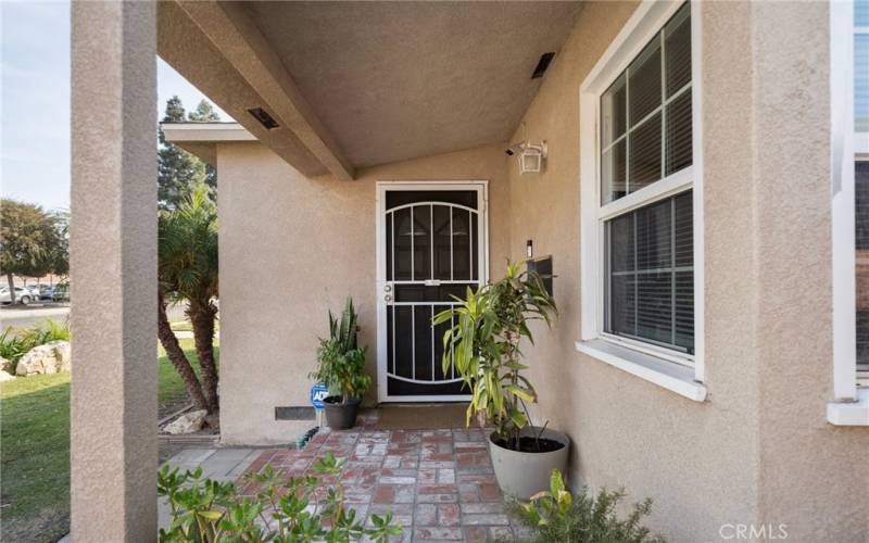 Covered front porch area perfect for enjoying your morning coffee.