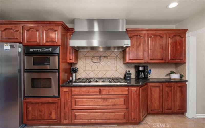 For you chef enthusiast this home features a six burner gas oven with pot filler, oven, and built in microwave.