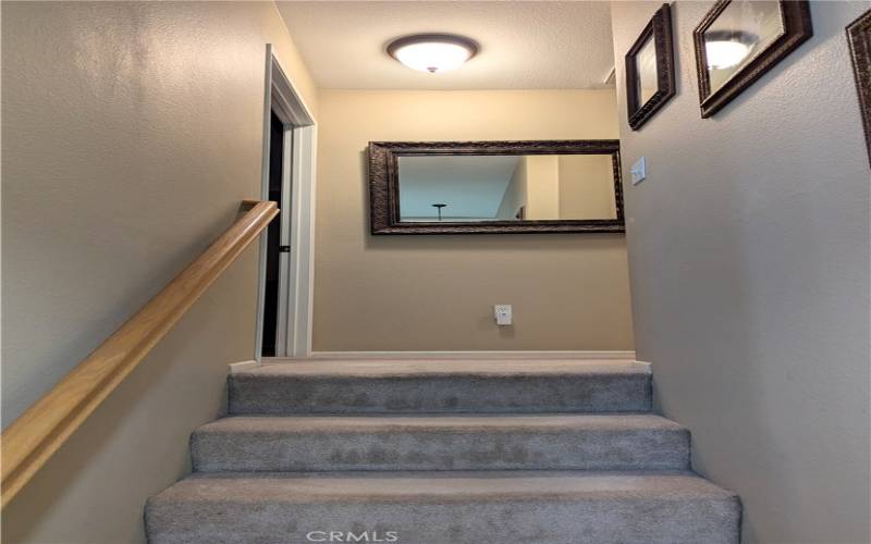 Stairs heading to second floor