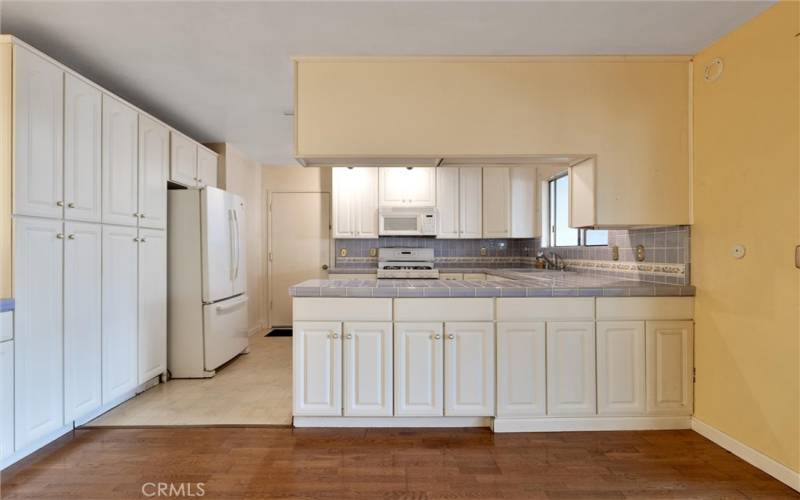 Extra cabinets throughout kitchen.