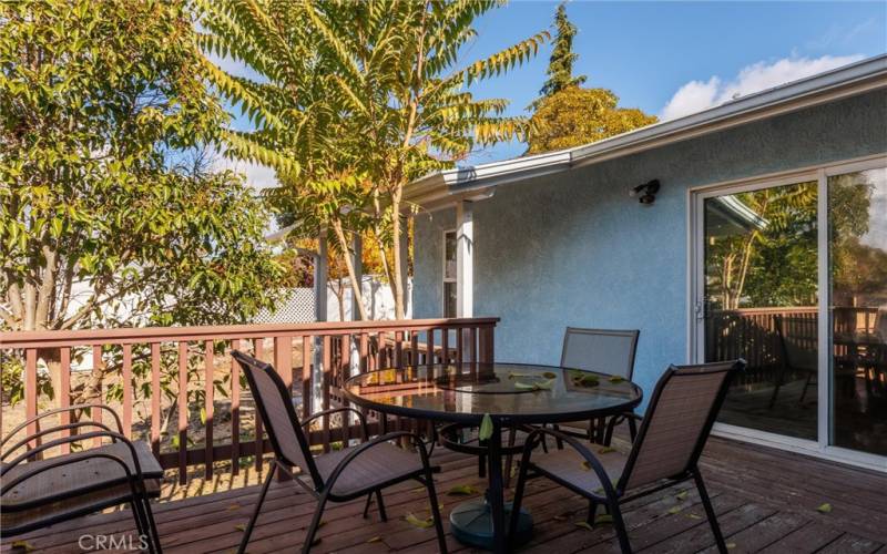 Deck & sitting area off primary & third bedroom.