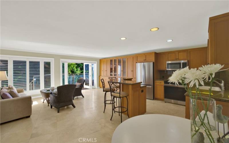 Dining area towards living room & kitchen.