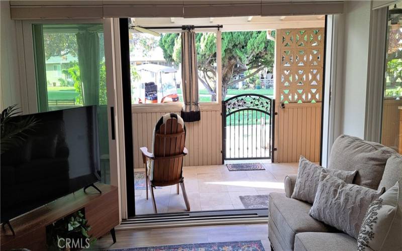 Living room with sliding glass wall open