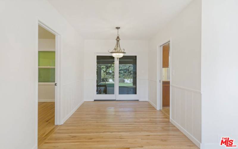 Dining Area, kitchen to the right & South BR to left