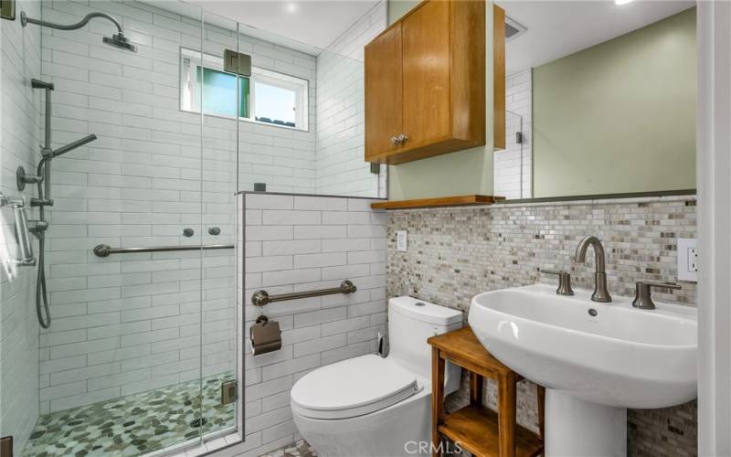 Beautifully remodeled hallway bathroom between bedroom #1 & #2