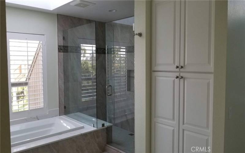 Part of the Large Master Bathroom with Separate Shower and soaking tub.