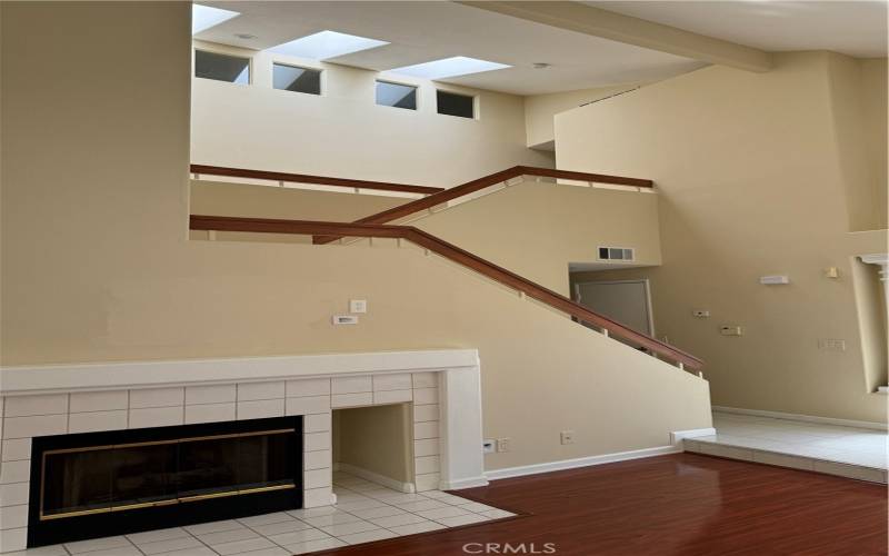 Vaulted ceilings with natural light through skylights