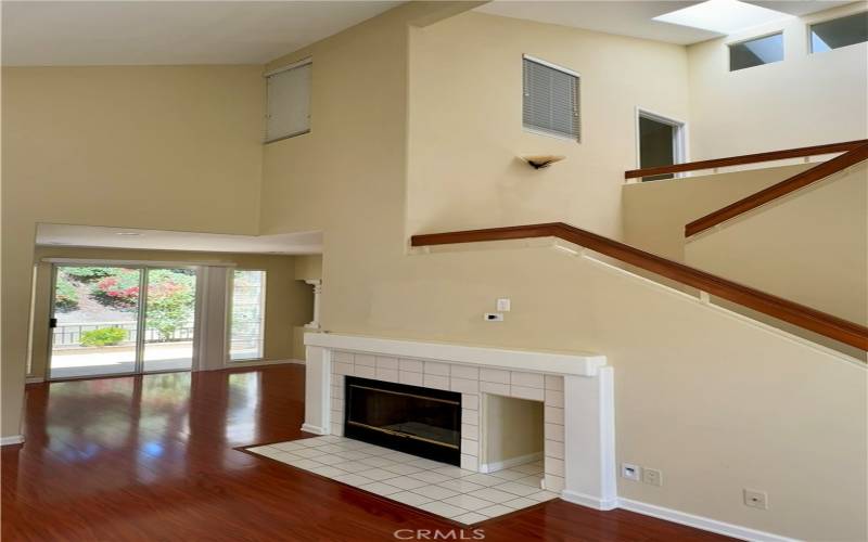 Living room looking towards dining room and slider to back patio