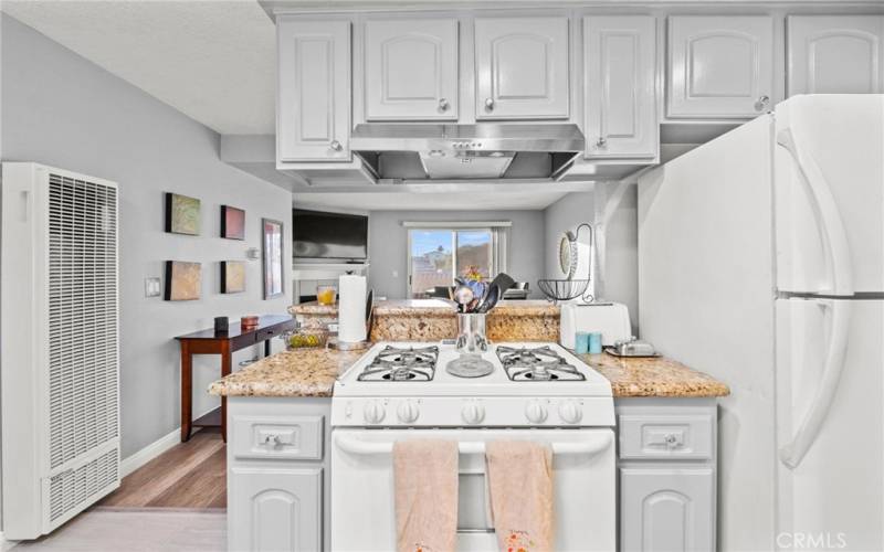 Kitchen open to dining and living room