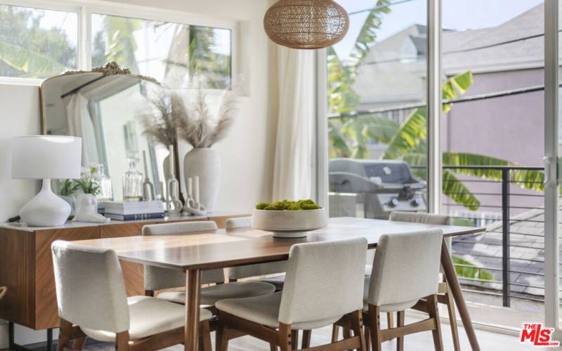 Dining area with walk-out BBQ balcony