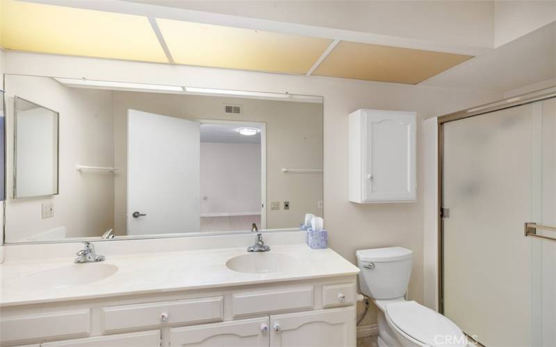 MASTER BATHROOM WITH DUAL SINKS AND WALK-IN SHOWER...