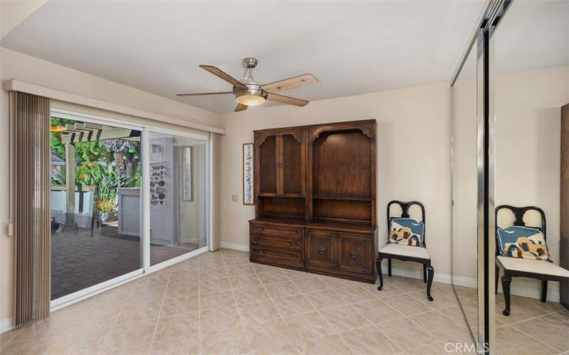 ROOM LEADING TO THE GARAGE AND FRONT COURTYARD...