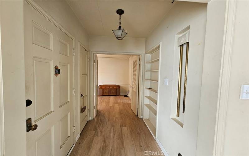 Entry way with coat closet & built in shelving