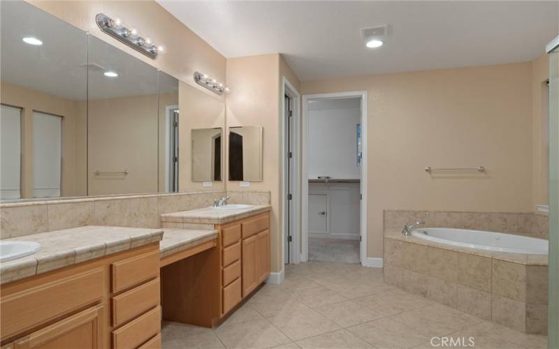 Dual vanity in upstairs primary bathroom