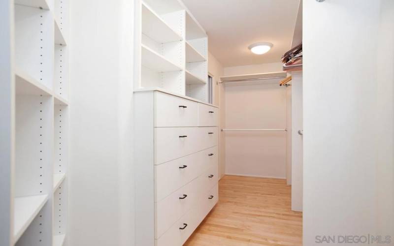 Primary bedroom walk-in closet