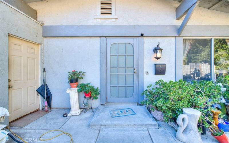 The door to the left goes to the garage and laundry.