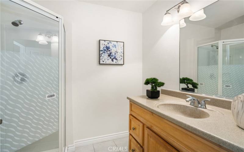 featuring a newly installed walk-in shower