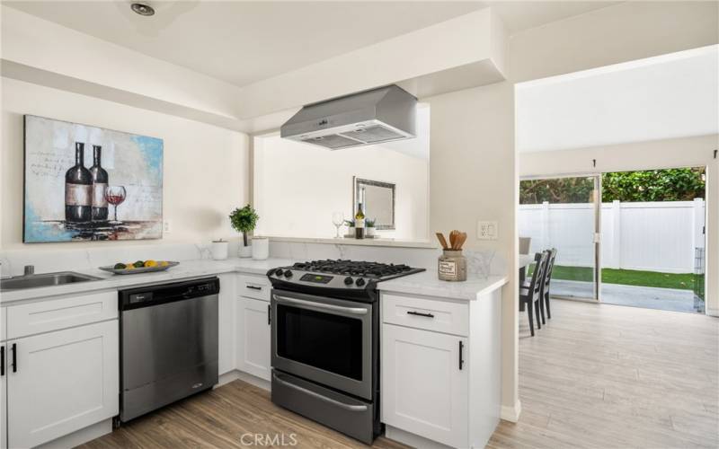 an open kitchen, with views of the yard