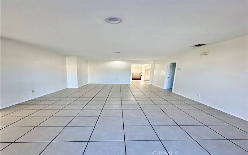 Living Room - tile flooring throughout each room - bedroom, kitchen, dining, and bathroom