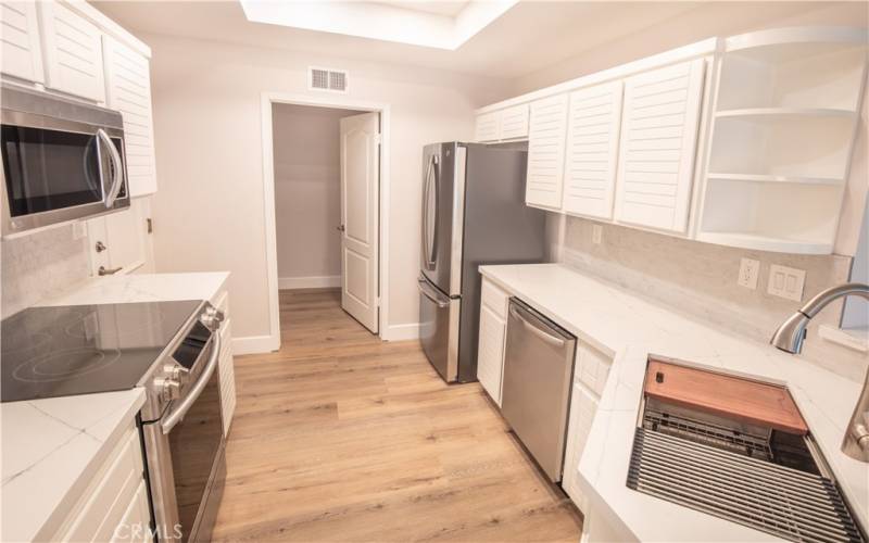 BEAUTIFUL COMPLETELY REMODELED KITCHEN WITH QUARTS COUNTERS