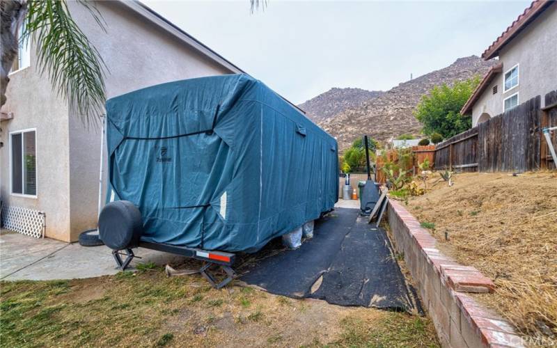 RV area, side of Garage, East side of rear yard.