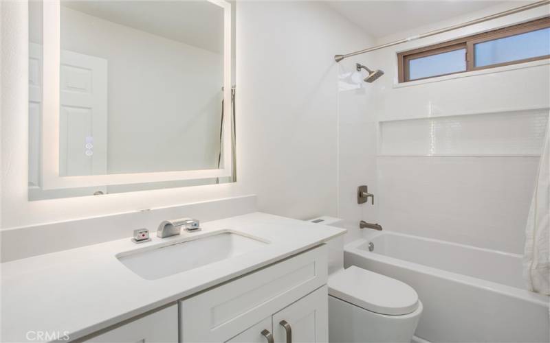 Hallway bathroom is remodeled completely. Has new upgraded tile flooring