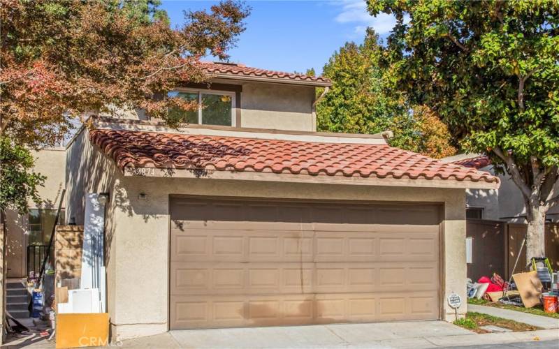 Attached 2 car garage with door opener with direct access