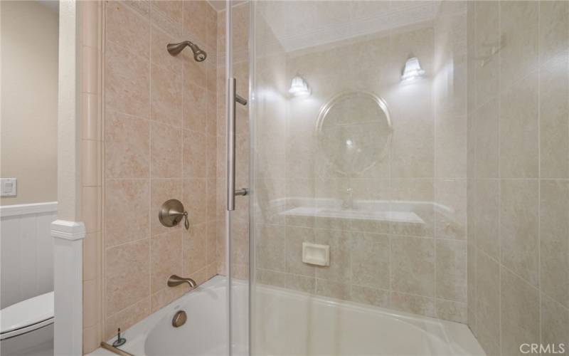 Hall bathroom with vanity & sink and tub/shower