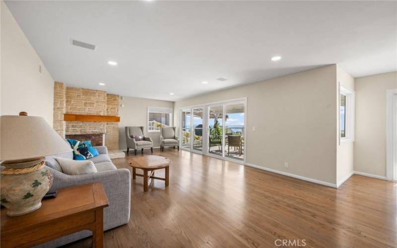 Family room with fireplace and ocean views