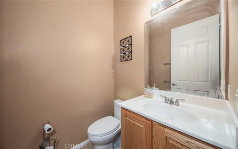 Powder Room located in Hallway.