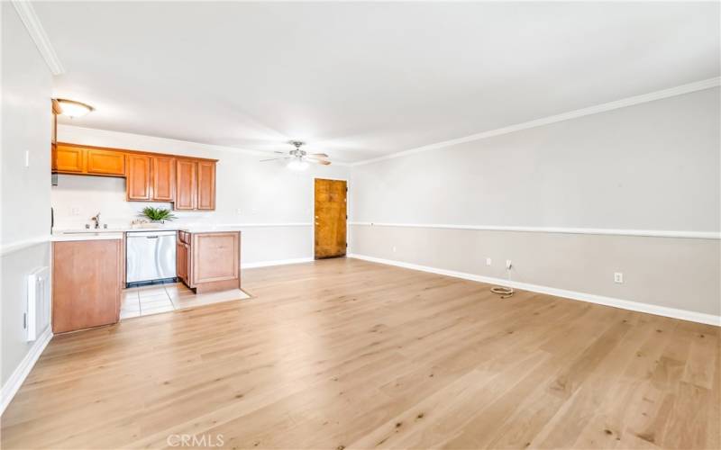 Open space concept with eating area adjacent to kitchen and living room