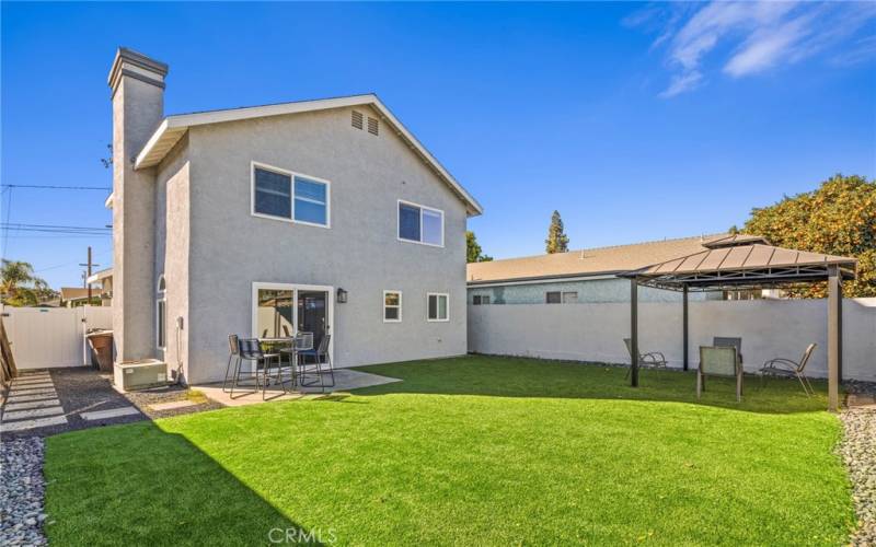 Green Turf in front of& back yard.