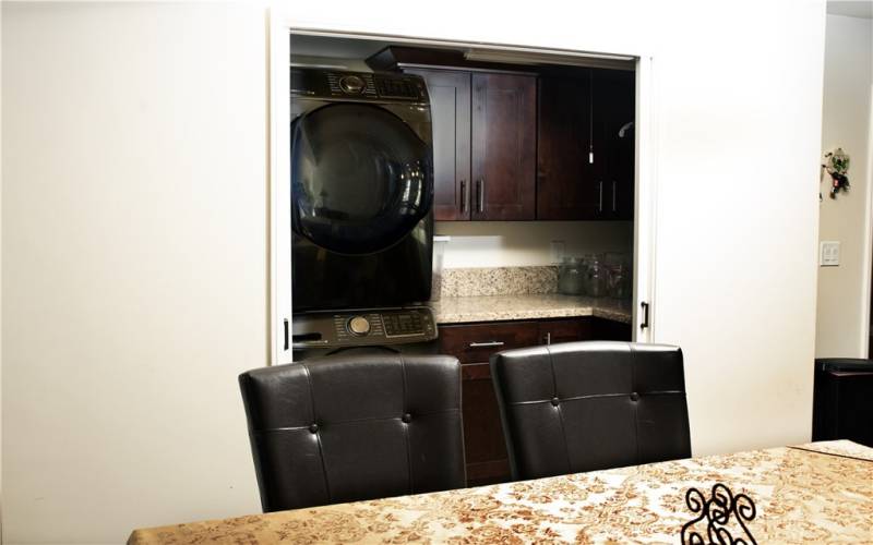 Laundry area with pocket doors