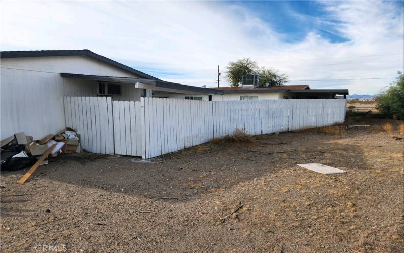 Right side of home Showing the Fence