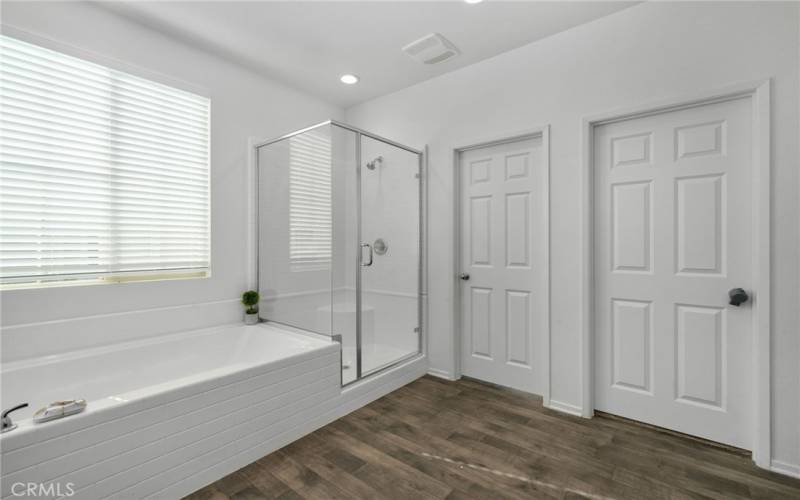 Primary Bathroom with walk in closet