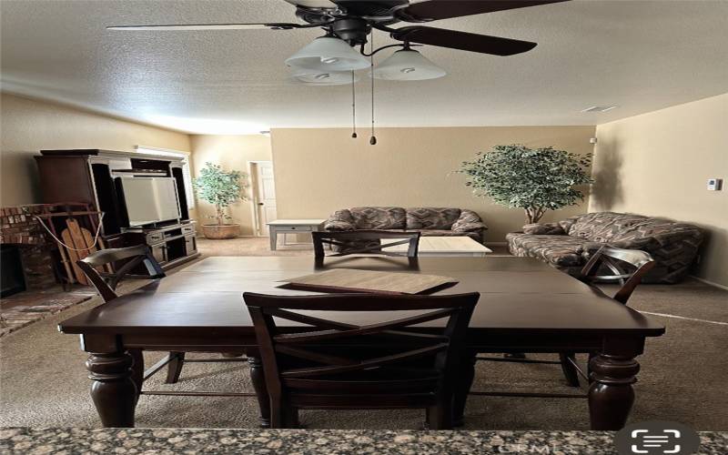 Family room with beautiful brick fireplace