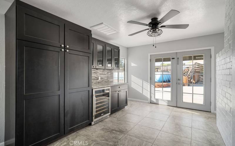 Dining Area with Built-Ins, including Wine Refrigerator & Access to Your Backyard Oasis!