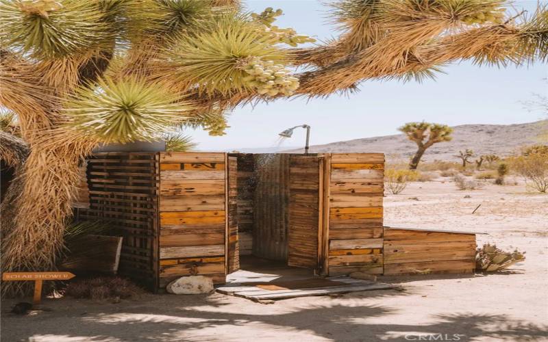 Open air solar shower