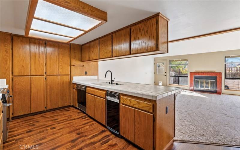 The kitchen is the center of the home and has ample cabinetry and countertop space making it ideal for meal prep.