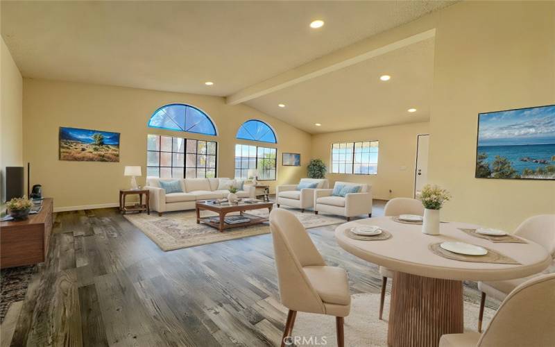 Dinning room flows into the living room. Virtually staged