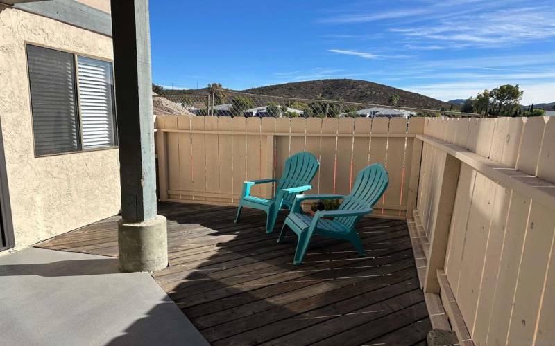 Private patio area with some wood decking