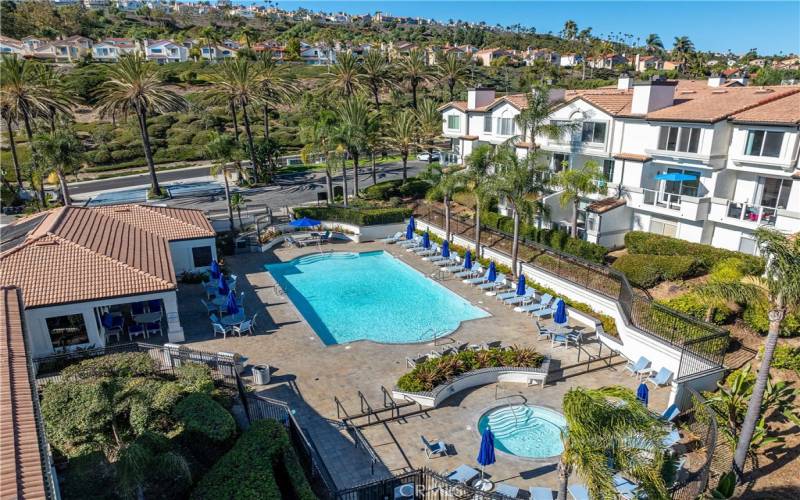 Resort Style Pool with Lounge chairs and Club House