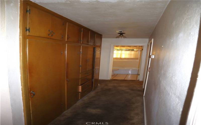 Hallway with built-in cabinets