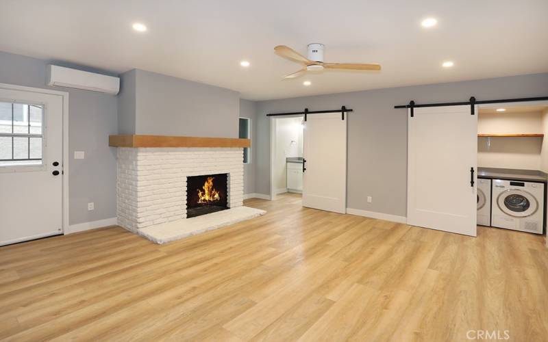 Primary Bedroom with Decorative Fireplace