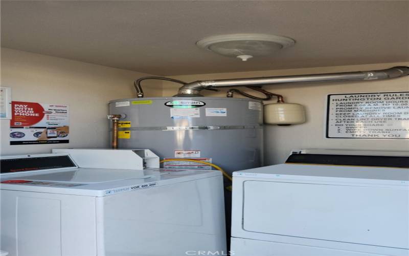 Shared community laundry area with only 4 neighbors. Next to your garage & a short walk from your home.