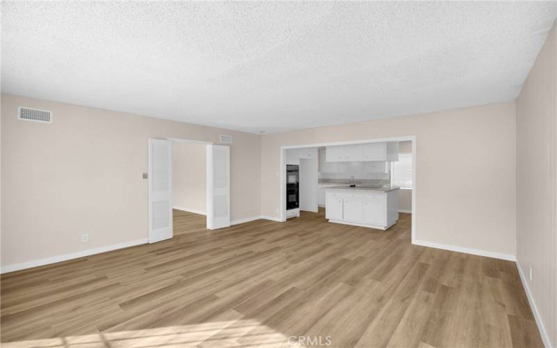 This home has new flooring and paint throughout the living areas. The new flooring is a durable laminate that is easy to maintain. The new paint is a neutral color that will match any decor.