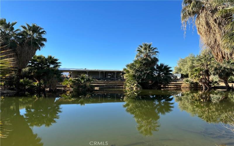 Looking at the Back Patio from accross the Lake