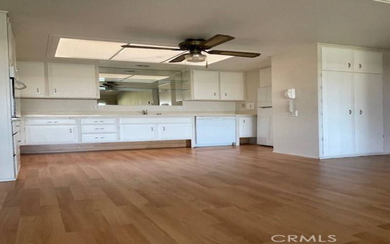 Skylight and ceiling fan in kitchen.